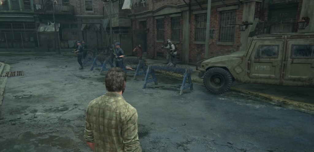 Joel watches armed soldiers near barricades in city street