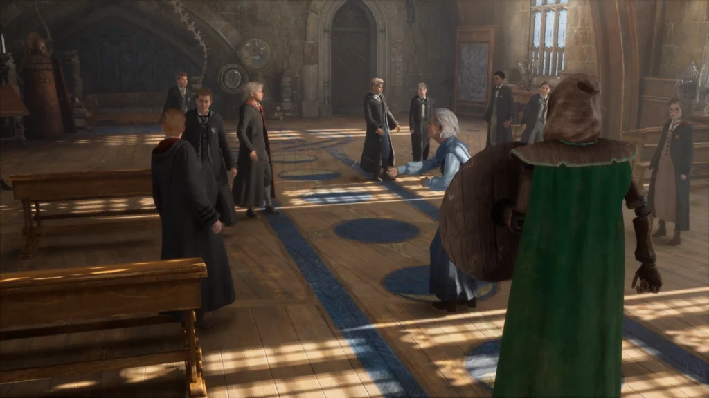 Hogwarts Legacy students gather in classroom with green-robed figure