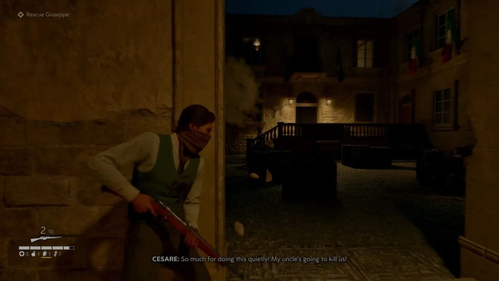 Man holding rifle behind wall in courtyard at night