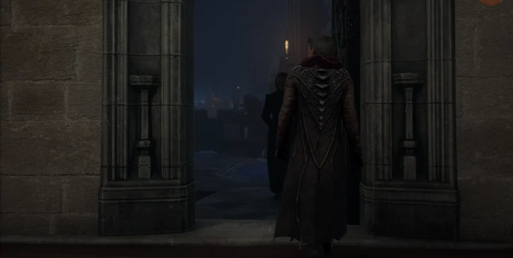 Man walking through stone doorway at night street