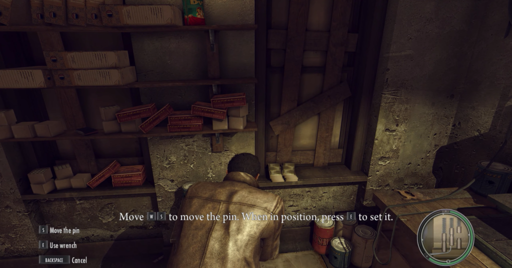 Man crouching near shelves, moving pin.