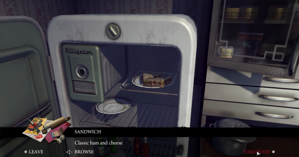 Alligator fridge with ham and cheese sandwich.