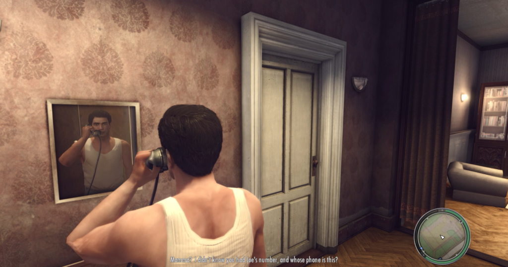 Man in tank top using phone.