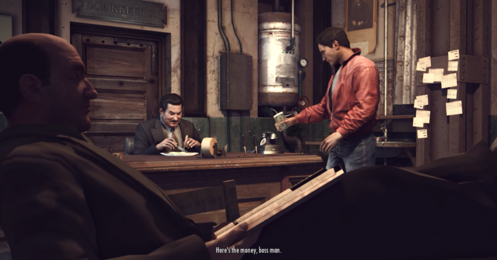 Man handing cash to seated man.