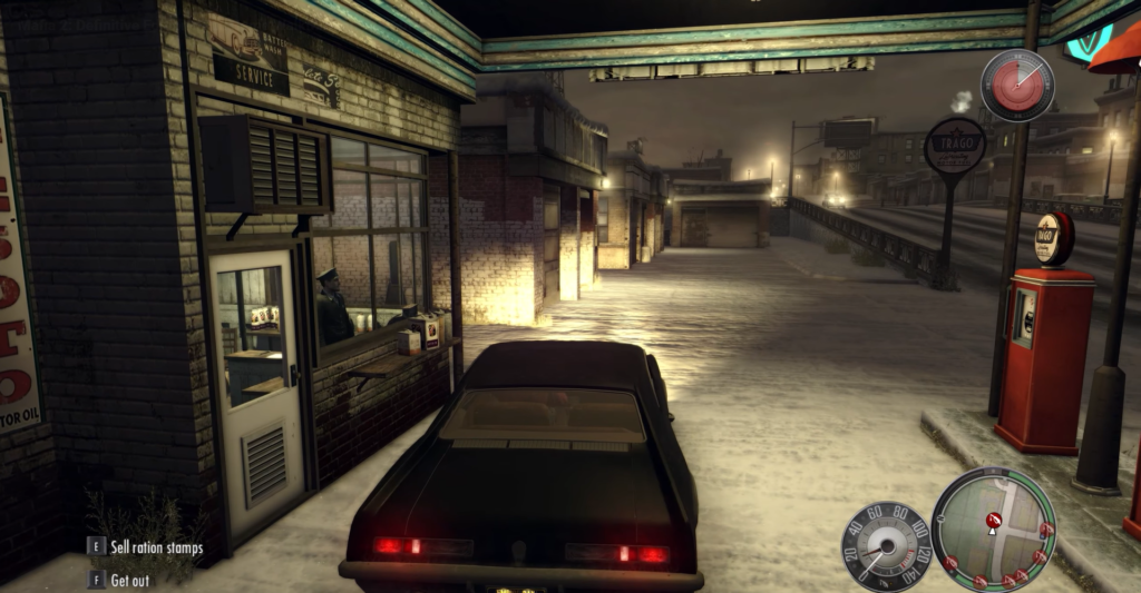 Black car parked near gas station.