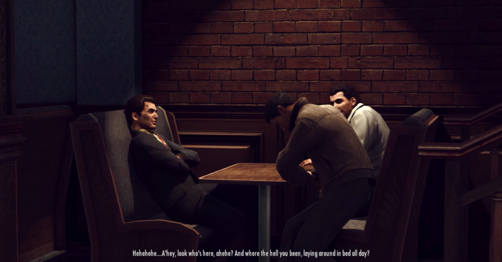 Three men sitting at wooden table.