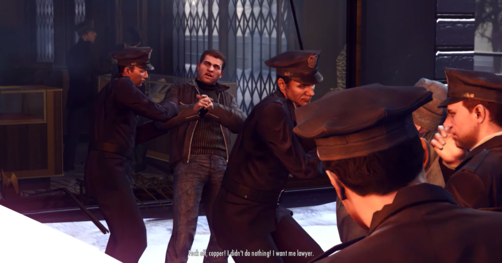 Police arresting man in leather jacket.