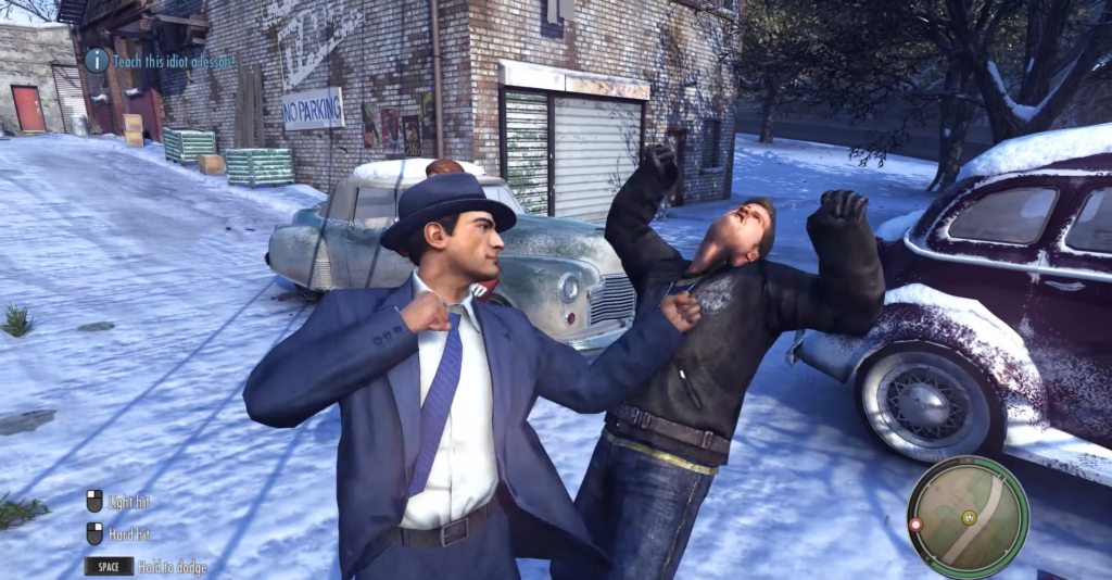 Man in suit punches another man.