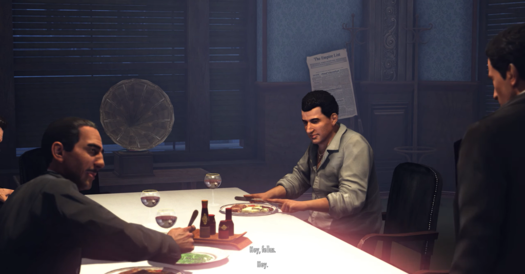 Four men dining at a table.