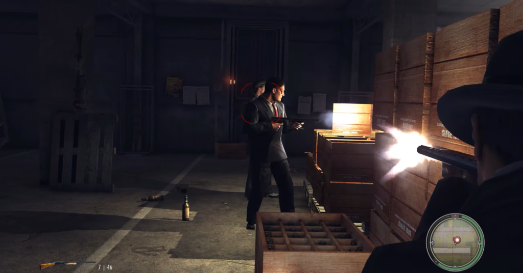 Man shooting gun behind wooden crates.