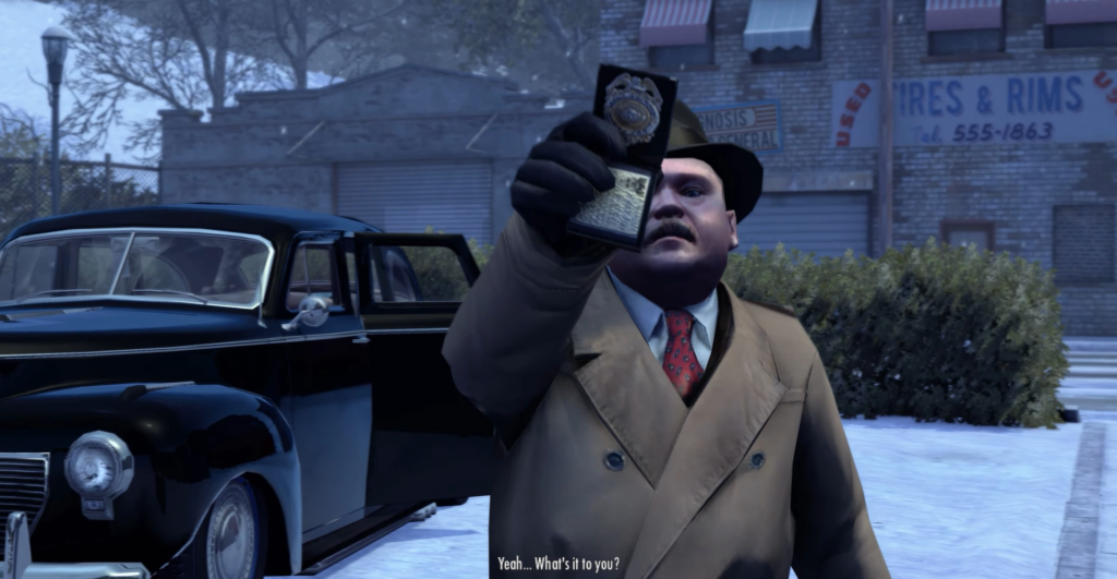 Man in coat displays badge outdoors.