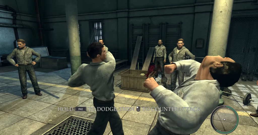 Two men fighting in prison setting.