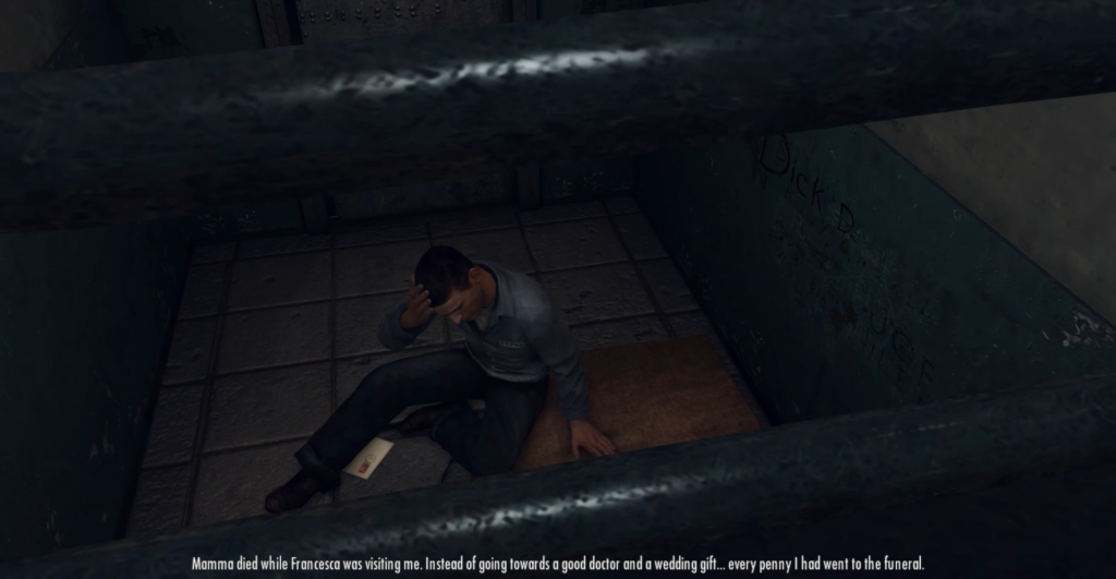 Man sitting on floor, distressed, letter.