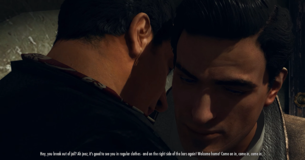 two men talking closely, dark clothing