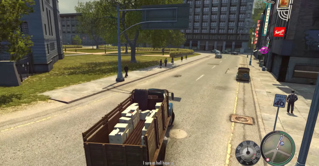 Truck loaded with boxes on street.