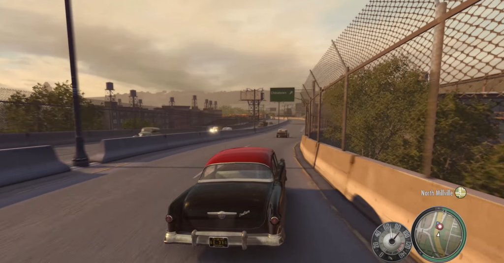 Classic black car with red roof.