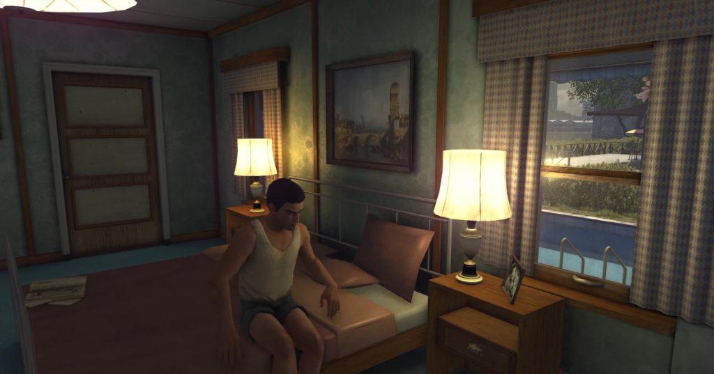 man sitting on bed in bedroom