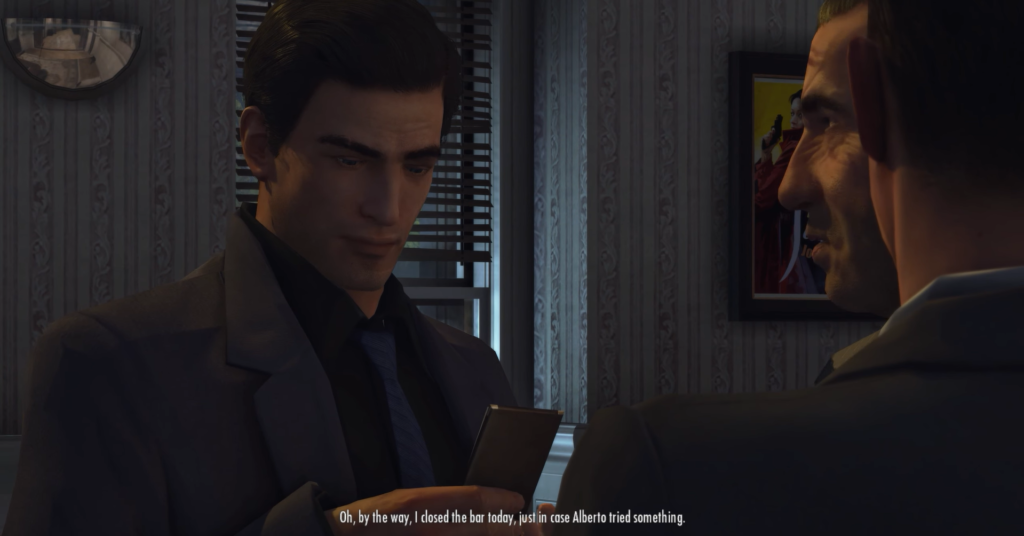 Two men discussing with smartphone indoors.