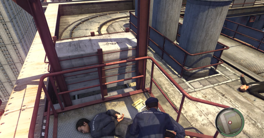 Police officer restraining suspect on rooftop.