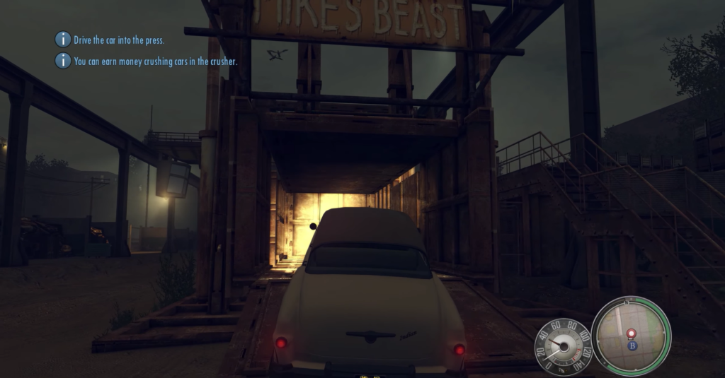 Car entering dimly lit garage ramp.