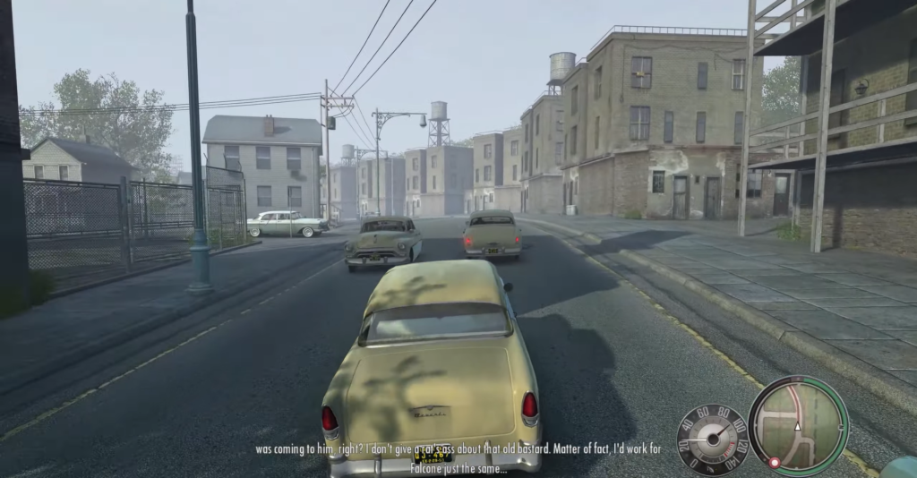 yellow vintage car driving urban street