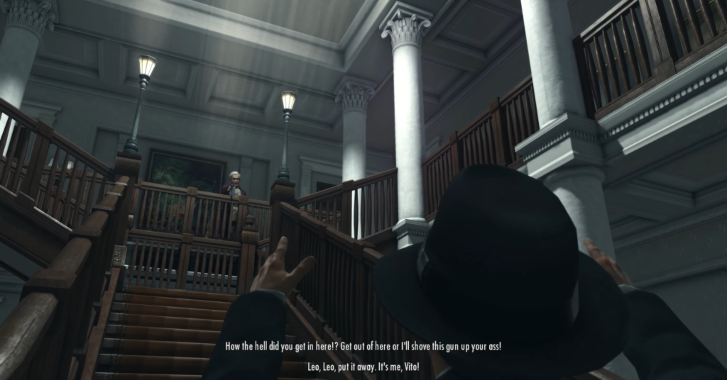 Man in black hat gestures upstairs.