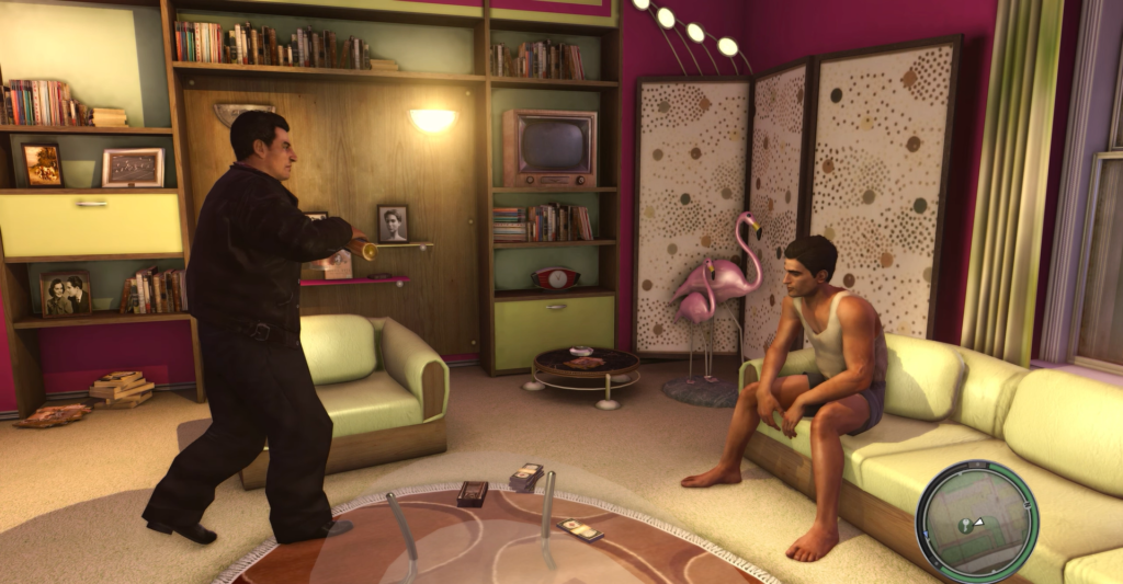 Man threatening seated man in living room.