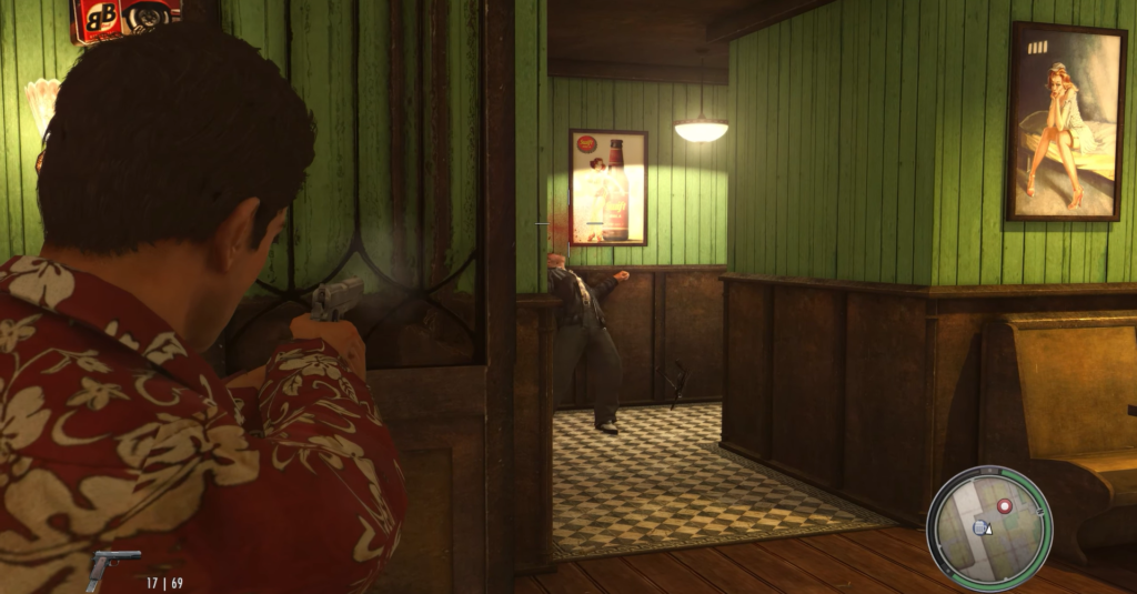 Man aiming gun in green room.