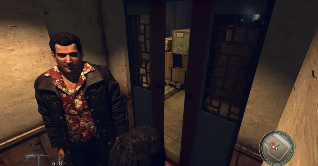 Man in floral shirt stands elevator.