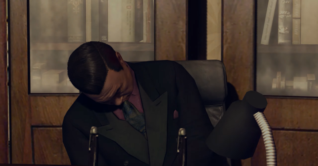 man slumped in chair, dark suit