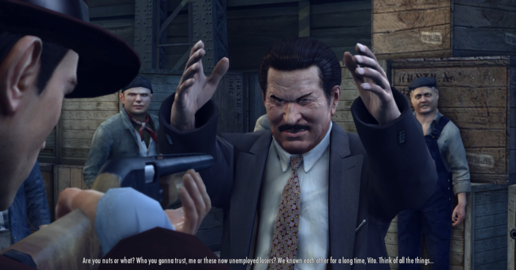 Man in suit threatens with gun.