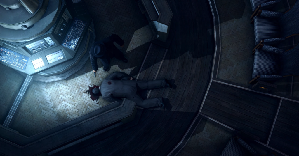 Man with gun stands over corpse.