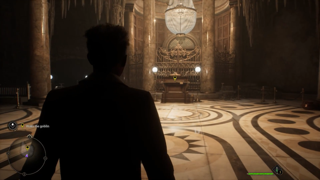 Man facing ornate room with chandelier.