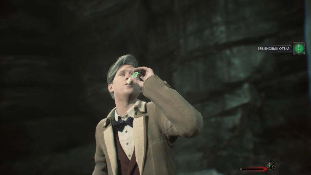 Man drinks potion in dark cave