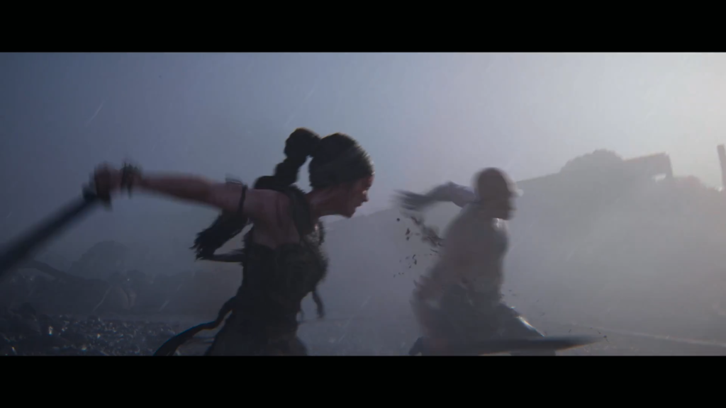 Warrior woman swings sword at man in fog