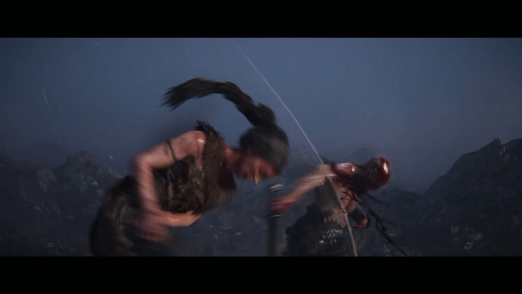 Warrior swings sword at enemy on rocky cliff