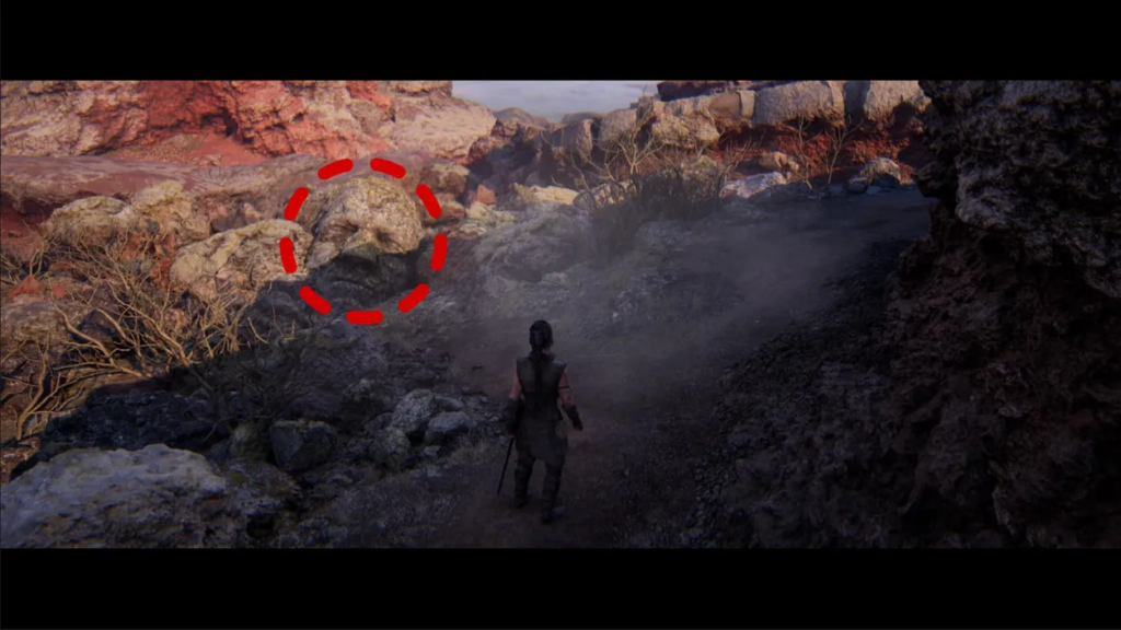 Senua walks along rocky path in Hellblade: Senua's Sacrifice