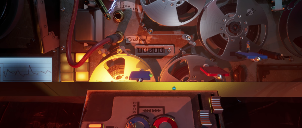 Tiny characters on reel-to-reel machine platform indoors