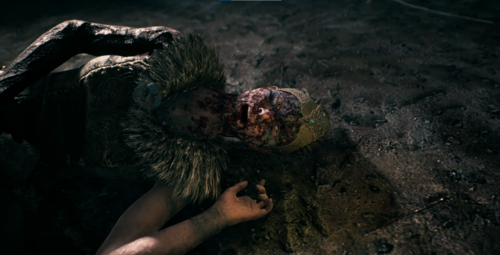 Окровавленный воин в короне лежит на земле