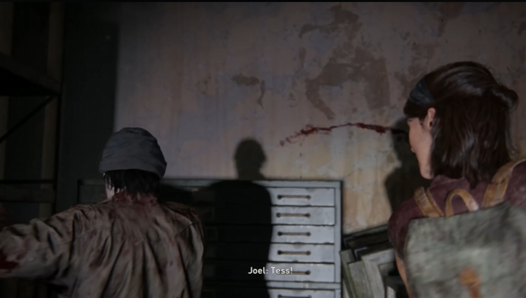 Joel and Tess in The Last of Us room