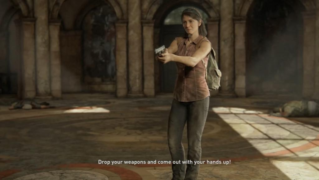Nadine Ross aims pistol inside stone hall, Uncharted 4