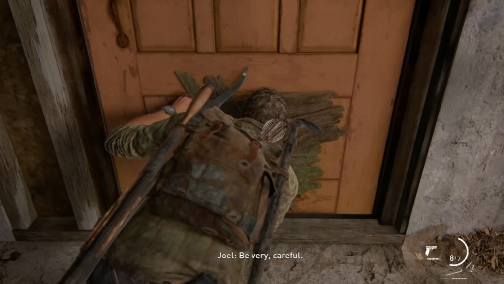 Joel opens boarded door in The Last of Us