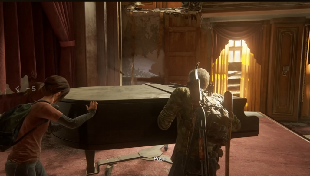Joel and Ellie push piano in abandoned room