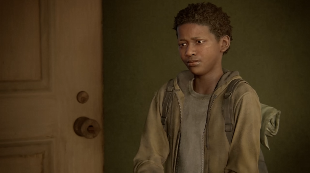 Young boy wearing backpack stands by door indoors