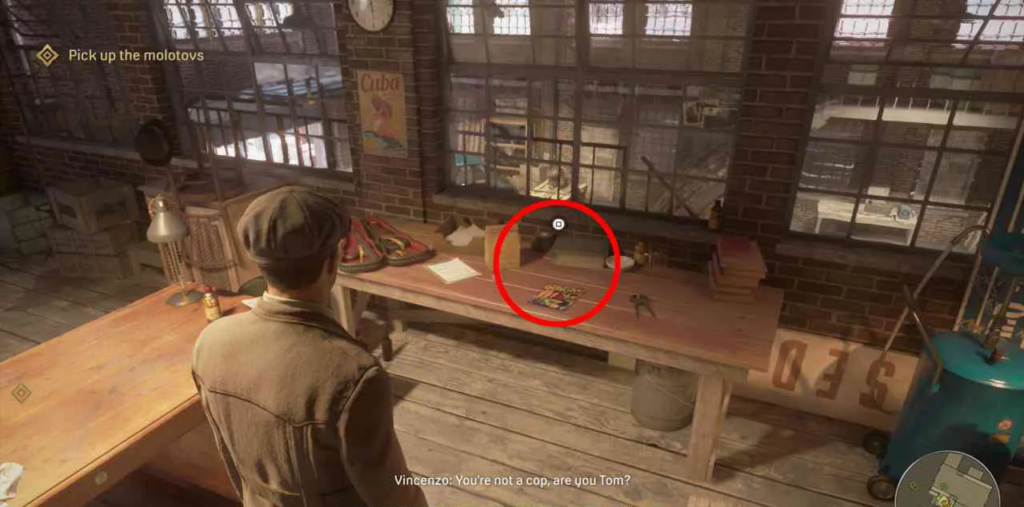 Mafia Definitive Edition character facing workbench in warehouse