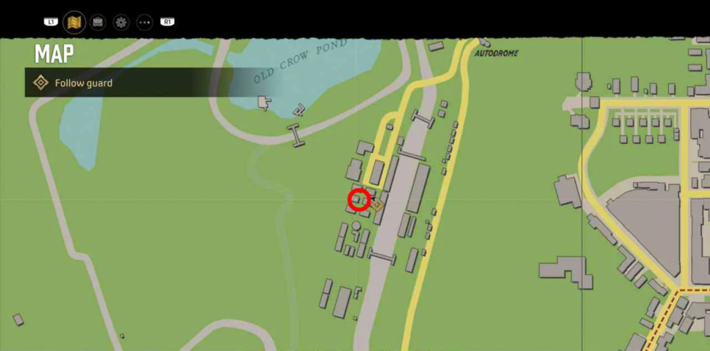 Game map showing red marker near buildings and road