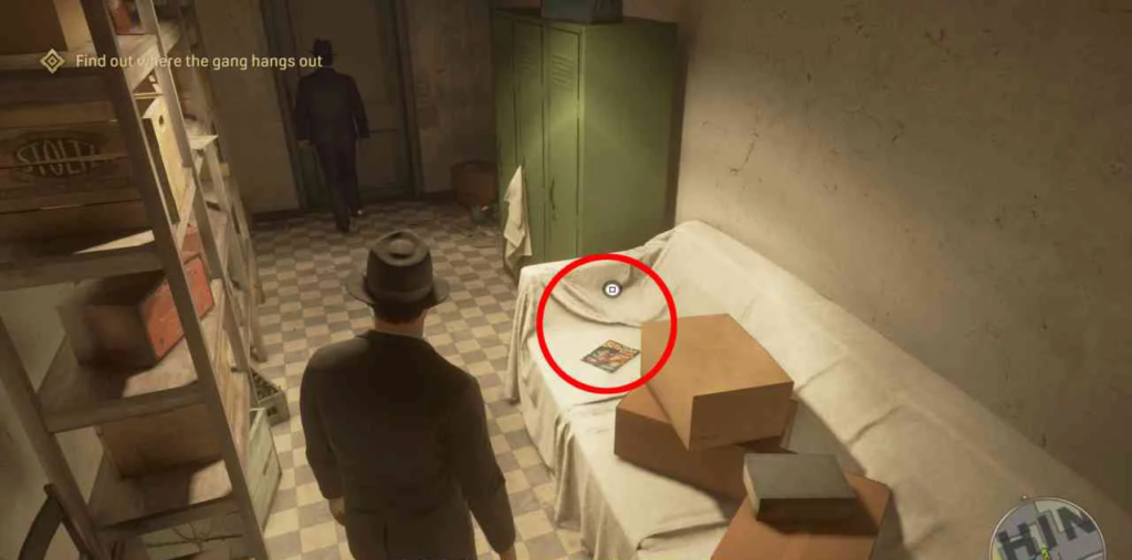 Mafia: Definitive Edition player approaches couch in storeroom