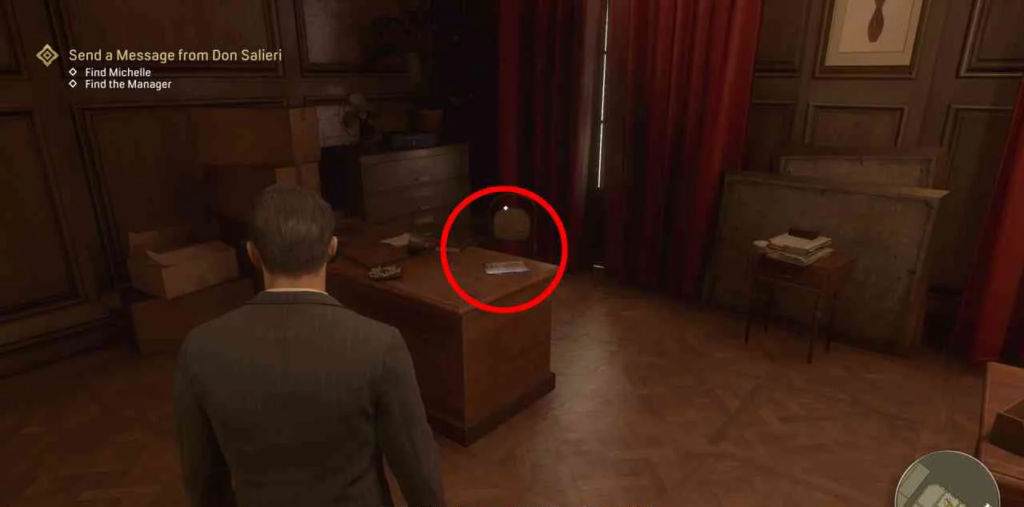 Mafia: Definitive Edition player facing desk in office
