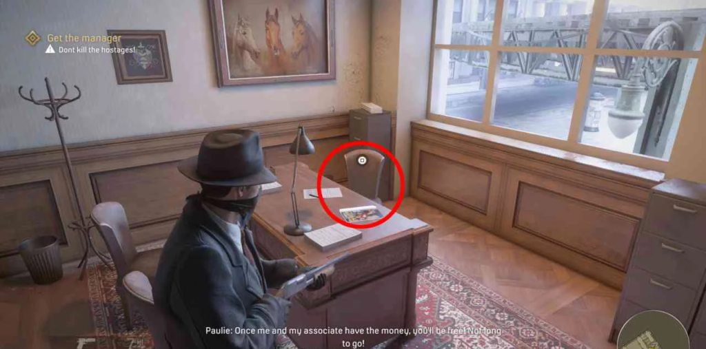 Mafia: Definitive Edition player aiming gun in office
