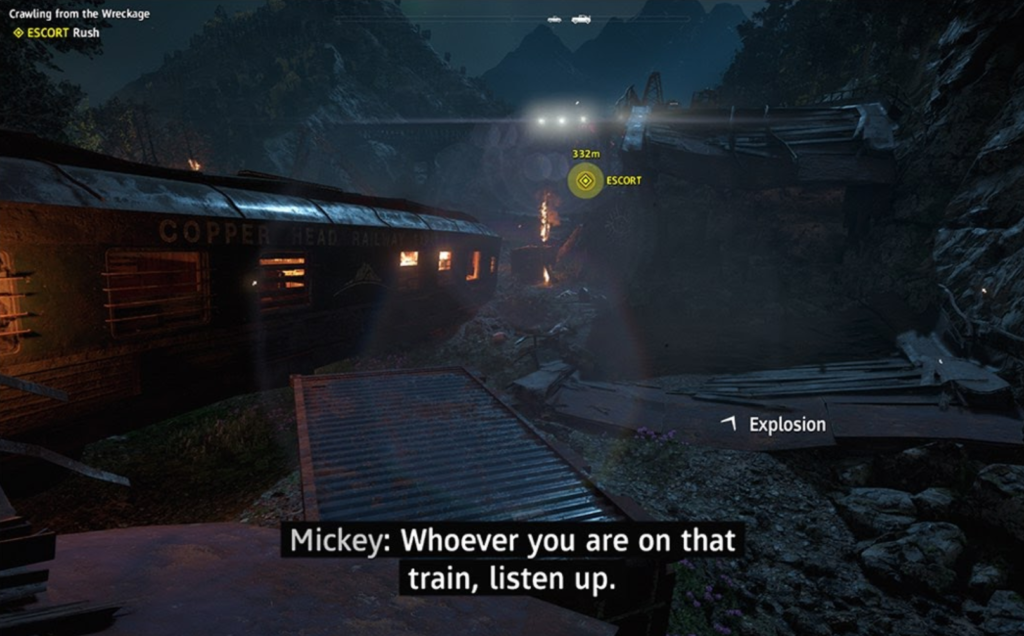 Train wreckage burning in mountain ravine at night